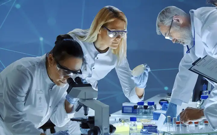 Scientists examining samples in a laboratory