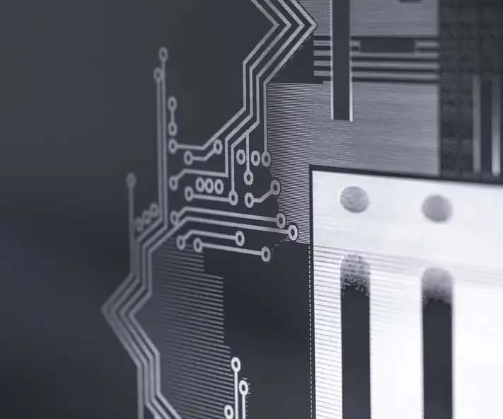 Glass panels that enable high-density interconnectors for advanced semiconductor packaging
