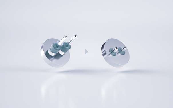 A pair of cylindrical glass-to-metal components with teal glass and metal pins transitioning from an exploded view on the left to a mated view on the right, shown on a silver glazed background