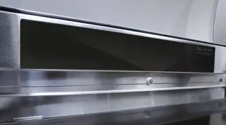 Back cover made using SCHOTT NEXTREMA® glass-ceramic for infrared rotisserie burner