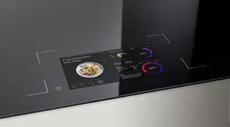SCHOTT CERAN® Luminoir™ TFT cooktop with an active recipe display and integrated temperature controls.