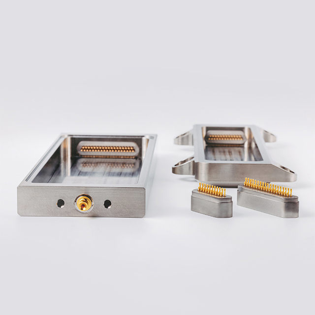 Titanium housings with hermetic connector feedthroughs