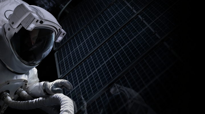 Astronaut working near solar panels in a space environment