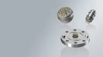 Glass-to-metal sealed connectors in different shapes and sizes.