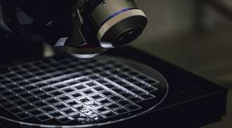 Microscope inspecting MEMS glass wafers