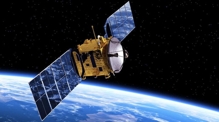 Orbiting satellite with solar panels