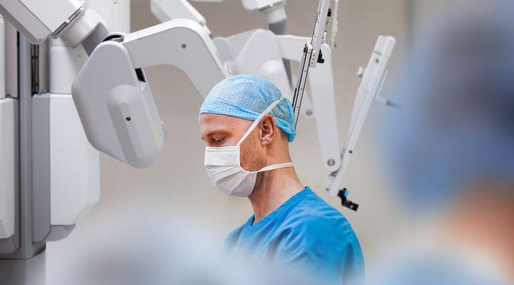 Robotic surgery system with medical professional in operating room