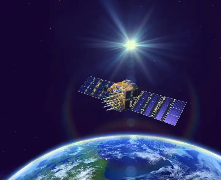 Satellite with photovoltaic solar panels orbiting the Earth