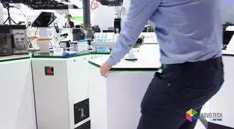 Man moving white modular laboratory unit