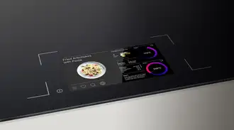 SCHOTT CERAN® Luminoir™ TFT cooktop with an integrated recipe view and color-coded temperature displays.