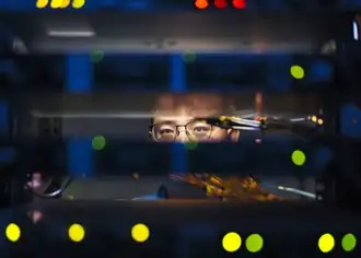 Mr. Jimmy Ye, the office IT engineer at server room of TC plant, Jinyun, China.