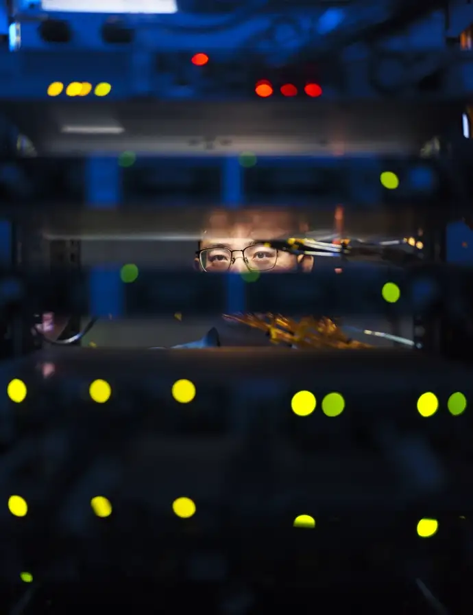 Mr. Jimmy Ye, the office IT engineer at server room of TC plant, Jinyun, China.