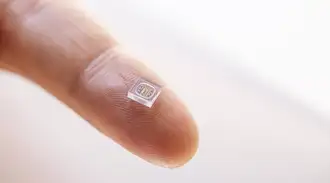 Miniature implant on fingertip